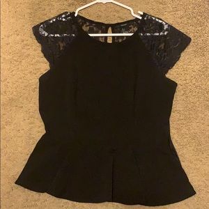 Peplum top with lace over the shoulders and back